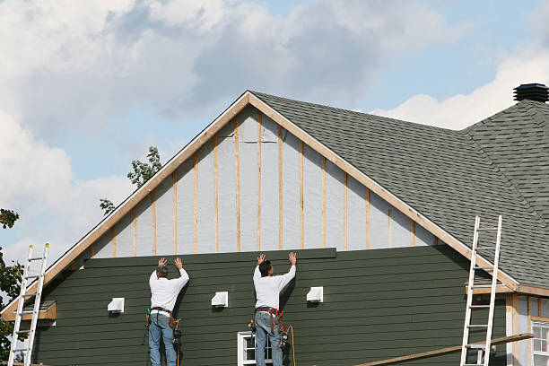 Professional Siding Installation technician working in Brighton, MA